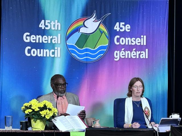 Moderator Kimberly Heath and General Secretary Michael Blair sitting at head table